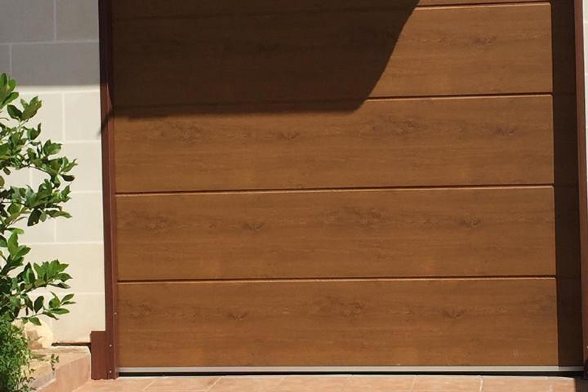 golden oak wood colour, garage doors Malta
